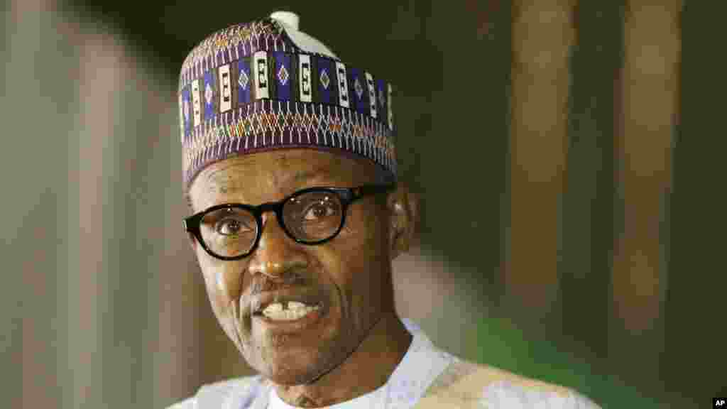 Nigerian former General Muhammadu Buhari speaks moments after he was presented with a certificate to show he won the election in Abuja, Nigeria, April 1, 2015.