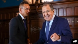 Угорський міністр закордонних справ Петер Сіярто з російським колегою у Москві 21 липня 2022 р.
