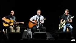 FILE - Eagles members Bernie Leadon (L) Don Henley and Glenn Frey (R)