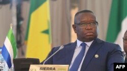 FILE — Sierra Leone President Julius Maada Bio at the 64th Economic Community of West African States Head of States and Government in Abuja, Dec. 10, 2023. Bio's government was criticized by a man charged with treason and other offenses in what officials call an attempted coup.