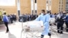 Medics transfer premature Palestinian babies evacuated from Gaza to ambulances on the Egyptian side of the Rafah border, Nov. 20, 2023.