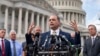 FILE - Rep. Bob Good, R-Va., and members of the conservative House Freedom Caucus hold a news event outside the Capitol in Washington, Sept. 12, 2023, as Congress faces a deadline to fund the government by the end of the month or risk a federal shutdown.