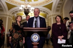 FILE - U.S. Senate Majority Leader Chuck Schumer (D-NY) addresses reporters following the Senate Democrats weekly policy lunch at the U.S. Capitol in Washington, July 11, 2023.