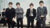 FILE - John Lennon, George Harrison, Ringo Starr and Paul McCartney arrive in Liverpool, England, on July 10, 1964, for the premiere of "A Hard Day's Night." 