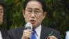 Japanese Prime Minister Fumio Kishida delivers a speech to support his ruling party’s candidate in a local election, near a train station in Wakayama, western Japan, April 15, 2023.