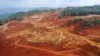 Lokasi penambangan nikel yang dioperasikan oleh Gema Kreasi Perdana (GKP) terletak di samping perkebunan milik warga desa di Wawonii, Sulawesi Tenggara, sebagai ilustrasi. Produsen nikel utama China, Tsingshan Group, memulai produksi pemurnian nikel di Indonesia. (Foto: AFP)