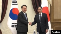윤석열 한국 대통령과 기시다 후미오 일본 총리가 지난달 나토 정상회의가 열린 리투아니아 빌뉴스에서 양자회담을 했다.