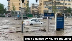 Dhoruba Doksuri yasababisha mafuriko katika viunga vya magharibi  vya Beijing, China.