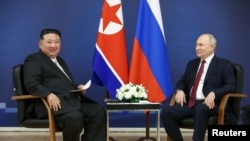 North Korea's leader Kim Jong Un, left, meets with Russia's President Vladimir Putin at the Vostochny Сosmodrome in Russia's far eastern Amur region, Sept. 13, 2023. (Sputnik/Artem Geodakyan/Pool via Reuters)