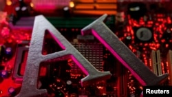 FILE - AI (Artificial Intelligence) letters are placed on a computer motherboard in this illustration taken, June 23, 2023. (REUTERS/Dado Ruvic/Illustration/File Photo)