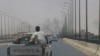Smoke rises in Omdurman, near Halfaya Bridge, during clashes between the Paramilitary Rapid Support Forces and the army as seen from Khartoum North, Sudan April 15, 2023. 
