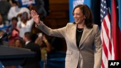 U.S. Vice President Kamala Harris waves during a campaign event at Westover High School in Fayetteville, N.C., on July 18, 2024.