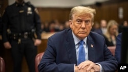 Former US President Donald Trump appears at Manhattan criminal court before his trial in New York, April 26, 2024.