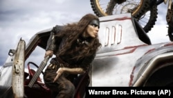This image released by Warner Bros. Pictures shows Anya Taylor-Joy in a scene from "Furiosa: A Mad Max Saga."