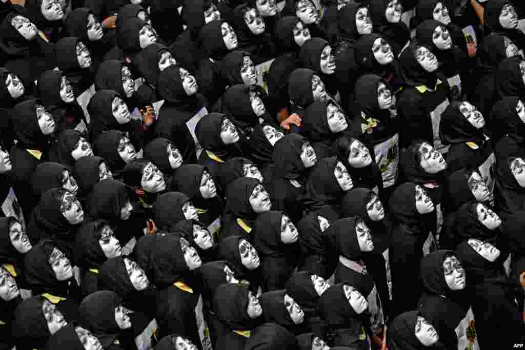 Students with painted faces gather in support of the Chandrayaan-3 spacecraft in Chennai, India. The Indian Space Research Organisation (ISRO) confirmed that the lander module of the Chandrayaan-3 had "successfully separated" from the propulsion module six days ahead of a planned landing slated for Aug. 23.