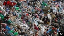 Garbage collected from Mount Everest is piled before it is sorted for recycling at a facility operated by Agni Ventures, an agency that manages recyclable waste, in Kathmandu, Nepal, June 24, 2024. 
