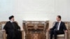 Presiden Suriah Bashar Assad (kanan), bertemu dengan Presiden Iran Ebrahim Raisi di istana kepresidenan di Damaskus, Suriah, Rabu, 3 Mei 2023. (Kepresidenan Suriah via Facebook via AP )