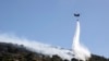 Greek firefighters battle new wildfire near Athens amid strong winds 