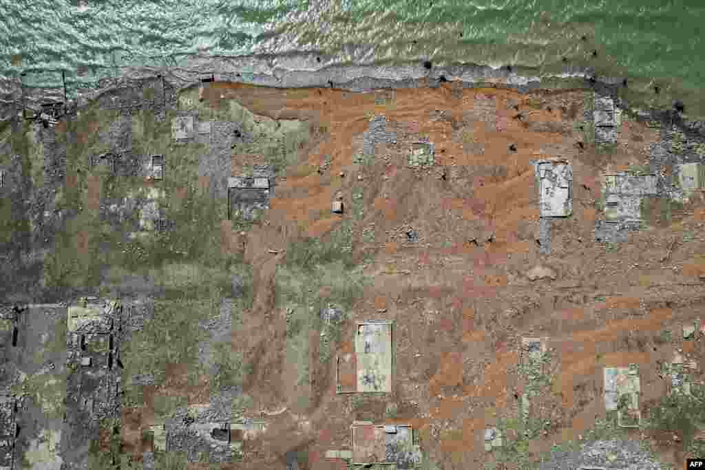 Remnants of the centuries-old town of Pantabangan reemerged in the northern Philippines after a dam’s water level dropped amid a drought that plagues many parts of the country.