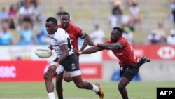 Mechi ya wanaume kati ya Fiji and Kenya iliyofanyika tarehe 21 January 2023 katika uwanja wa FMG huko Hamilton New Zealand. Picha na MICHAEL BRADLEY / AFP. 