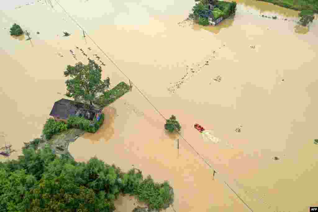 A flood-affected village is seen following heavy rains caused by Typhoon Gaemi in Zixing, in central China's Hunan province, July 28, 2024.