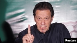 FILE - Pakistan's former Prime Minister Imran Khan, speaks to the members of the media at his residence in Lahore, Pakistan, May 18, 2023.