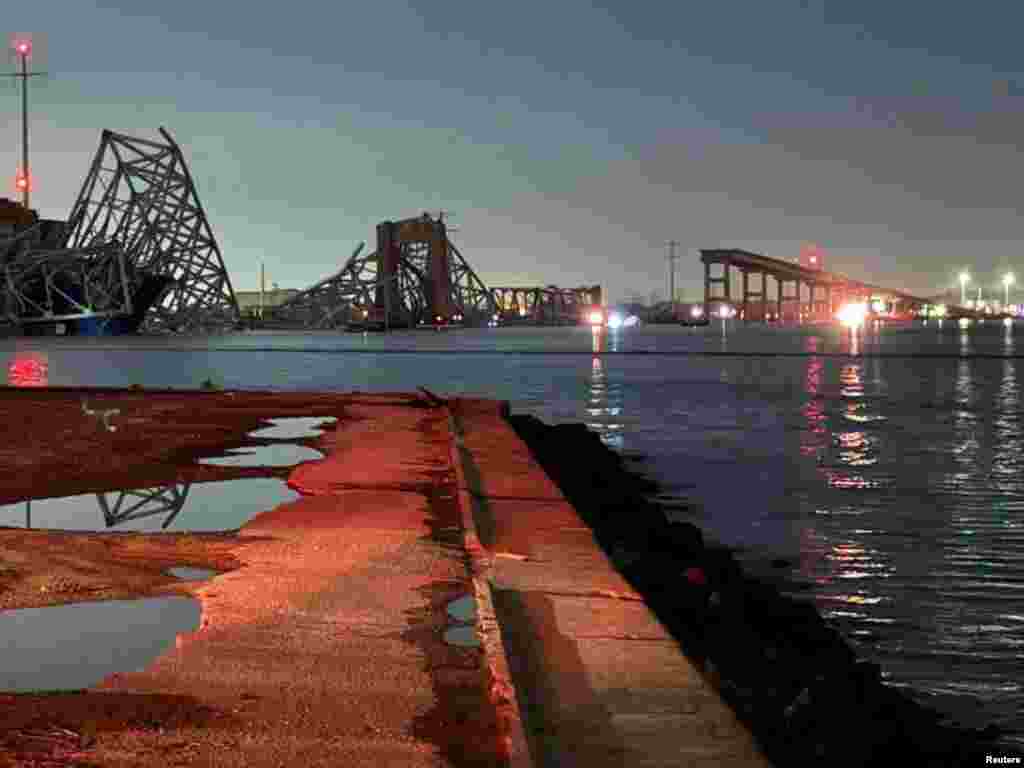 A view of the Francis Scott Key Bridge after it collapsed, in Baltimore, March 26, 2024, in this picture released by Harford County MD Fire & EMS.