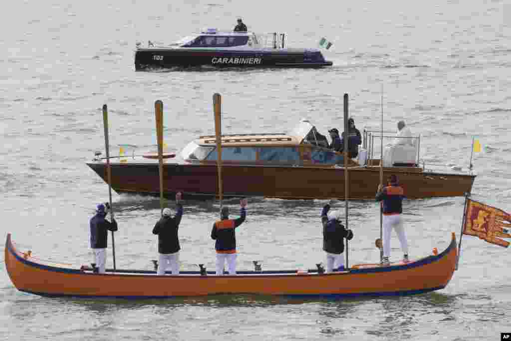 Pope Francis is greeted by Gondoliers upon his arrival in Venice, Italy.