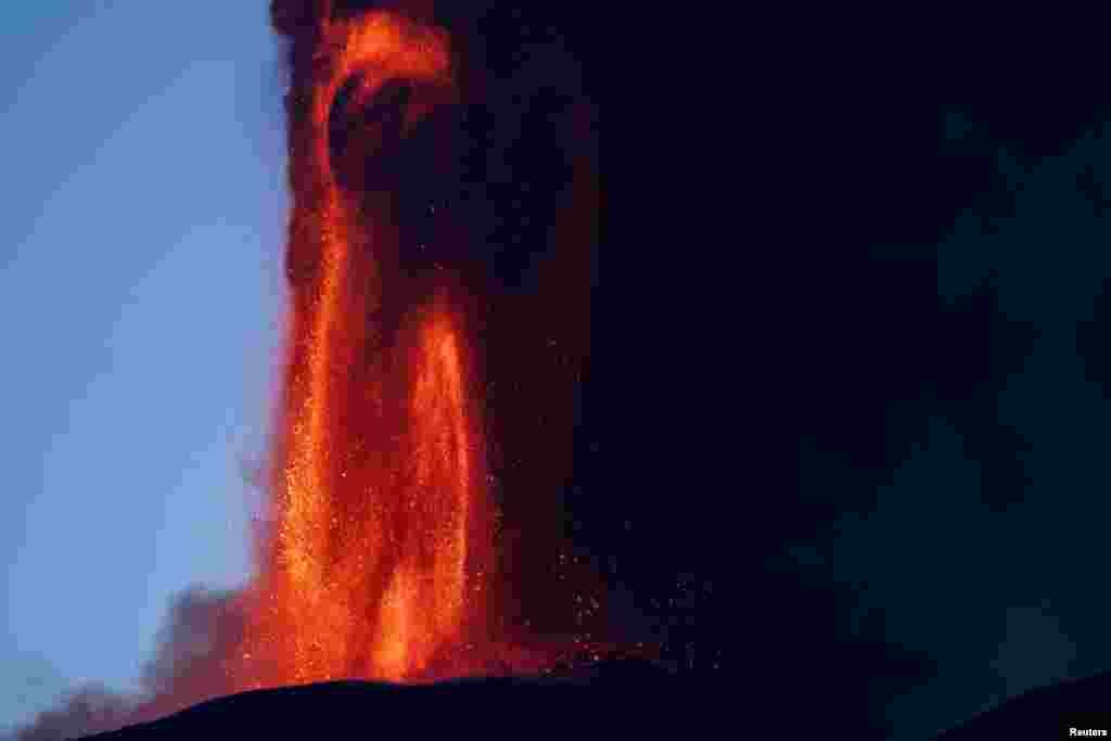 Lava rises from a crater of Mount Etna, Europe's most active volcano in Italy.