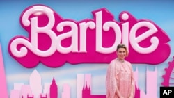 FILE - Writer/director/executive producer Greta Gerwig poses for photographers upon arrival at the premiere of the film 'Barbie' in London, Britain, July 12, 2023. (Scott Garfitt/Invision/AP)