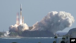 An HII-A rocket blasts off from the launch pad at Tanegashima Space Center in Kagoshima, southern Japan Thursday, Sept. 7, 2023. (Kyodo News via AP)