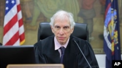 FILE - Judge Arthur F. Engoron presides over former President Donald Trump's civil business fraud trial at New York Supreme Court, in New York, Oct. 17, 2023. Authorities responded to a bomb threat at the judge's Long Island, N.Y., home on Jan. 11, 2024. Nothing amiss was found. 