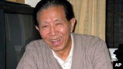 FILE - Military surgeon Jiang Yanyong is seen in a hotel room in Beijing, China, Feb. 9, 2004.