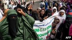 Pro Female Genital Mutilation (FGM) protesters gather outside the National Assembly in Banjul, Gambia, on March 18, 2024.