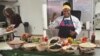 Chef Mhlelusizo Ncube showcasing Zimbabwean cuisines at the African Cuisine & Art Festival in New Mexico, USA
