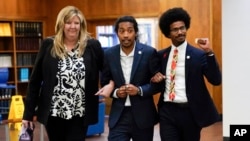 Tennessee Representative Gloria Johnson of Knoxville, left, Justin Jones, center, and Justin Pearson arrive at Fisk University, Tennessee, on April 7, 2023, to meet with Vice President Kamala Harris after Jones and Pearson were expelled from the Tennessee House of Representatives. Johnson survived the effort to expel her.