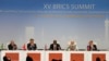 South African President Cyril Ramaphosa (C) delivers the XV BRICS summit declaration flanked by from left, Brazil's Luiz Inacio Lula da Silva, China's Xi Jinping, India's Narendra Modi and Russia's Sergey Lavrov, in Johannesburg, Aug. 24, 2023.