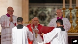 Pope Francis celebrates the Palm Sunday mass in St. Peter's Square at the Vatican, March 24, 2024. 
