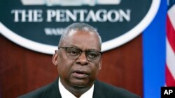 FILE - Secretary of Defense Lloyd Austin speaks at a virtual Ukraine Defense Contact Group meeting, Nov. 22, 2023, at the Pentagon. Austin has been released from the hospital where he was treated for complications from surgery for prostate cancer.