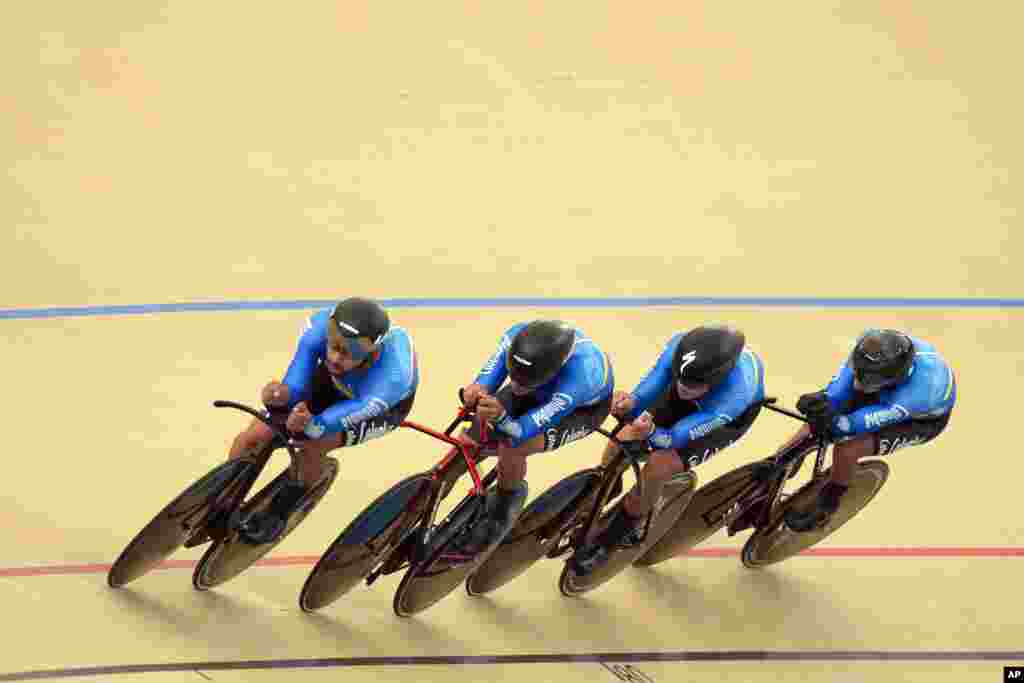 Colombia's cyclers Brayan Sanchez, Jordan Parra, Juan Arango and Nelson Soto ride during the men's team pursuit qualifiers at the Pan American Games in Santiago, Chile.