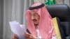 FILE - Saudi King Salman bin Abdulaziz gives virtual speech during the first session of Shura council, from his palace in NEOM, Saudi Arabia, Nov. 11, 2020. (Bandar Algaloud/Courtesy of Saudi Royal Court/Handout via Reuters)