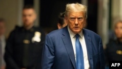 FILE - Former U.S. President Donald Trump arrives for his hush money trial at Manhattan Criminal Court in New York City, on May 20, 2024. 