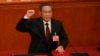 Perdana Menteri China terpilih, Li Qiang, sedang membaca sumpah jabatan dalam sesi Kongres Nasional Rakyat di Beijing, China, Sabtu, 11 Maret 2023. (Foto: (AP Photo/Mark Schiefelbein)