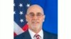 (USA) Deputy Assistant Secretary in the Bureau of African Affairs, Ambassador Robert Scott