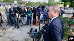 San Jacinto County district attorney Todd Dillon, right, speaks about suspect Francisco Oropeza at the San Jacinto County Public Safety Building in Coldspring, Texas, May 3, 2023. Oropeza, suspected of killing five of his neighbors, is in custody. 
