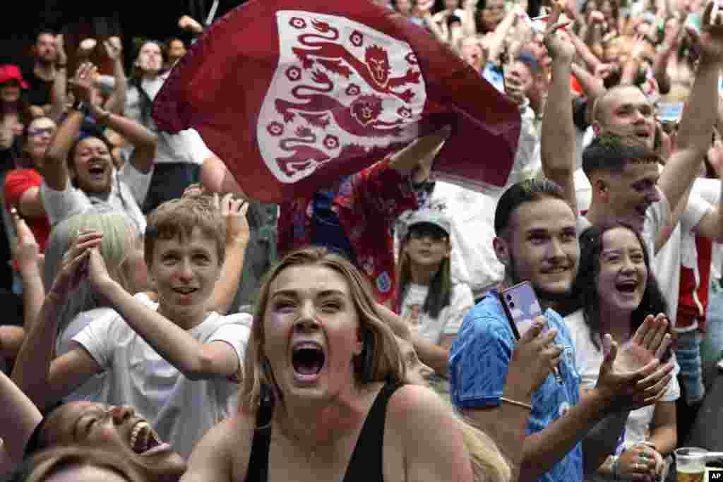 Fans watch a screening at BOXPARK Wembley in London as England wins the Women's World Cup 2023 semifinal soccer match against Australia.