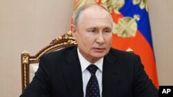 Rais wa Russia Vladimir Putin akiongoza mkutano wa wajumbe wa Baraza la Usalama kwa njia ya mtandao kwenye ikulu ya Kremlin mjini Moscow, Agosti 25, 2023