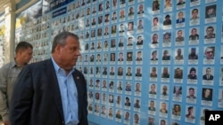 FILE - Republican presidential candidate Chris Christie visits the Wall of Remembrance to pay tribute to killed Ukrainian soldiers, in Kyiv, Ukraine, Aug. 4, 2023.