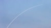 ARCHIVO: Un misil desde el sistema de defensa Domo de Hierro de Israel intercepta cohetes lanzados desde el sur del Líbano el 14 de junio de 2024.