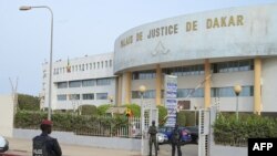Policemen and gendarmes are seen at the entrance to the Dakar courthouse, Senegal, June 1, 2023. A court sentenced opposition leader Ousmane Sonko, a candidate in the 2024 presidential election, to two years in prison.